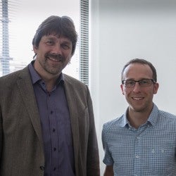 Uwe Sibert and Nick Latimer smiling at camera.