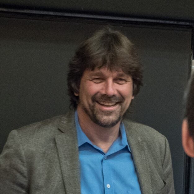 Uwe Siebert smiling at camera