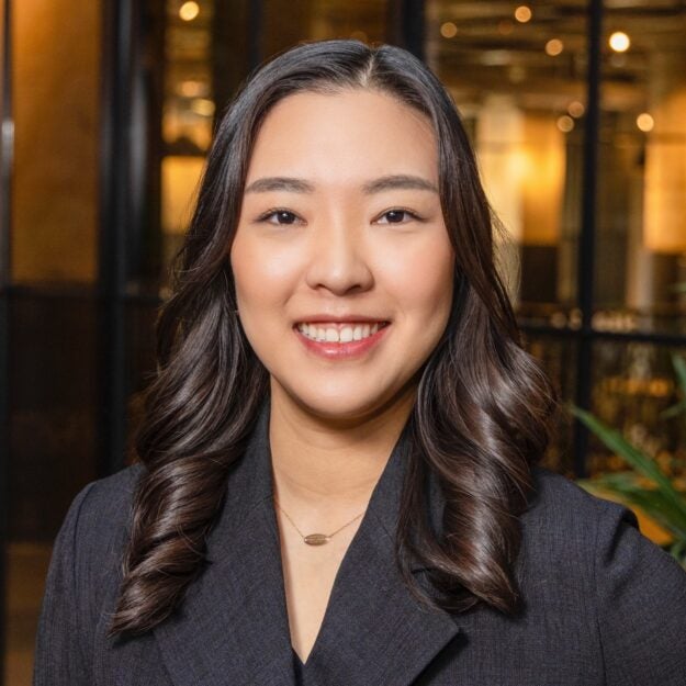 Headshot of Ellen Kim DeLuca