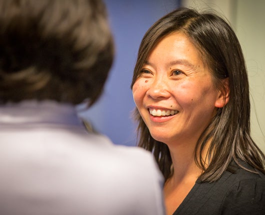 Jennifer Yeh smiling, looking off camera
