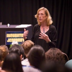 Image of Sue Goldie Giving Lecture.