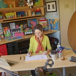 Image of Eve Wittenberg Filming in the GHELI Studio.