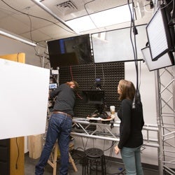 Jake Waxman and Meg Harding Assembling Technical Equipment in Media Hub.