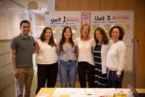 Team members stand and smile for camera. From left to right: Kian Sani, Christina Fasano, Janice Jhang, Sue J. Goldie, Megan Harding, Pardis Sabeti